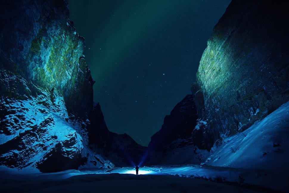 Free Image of Man Standing in the Middle of a Dark Tunnel 