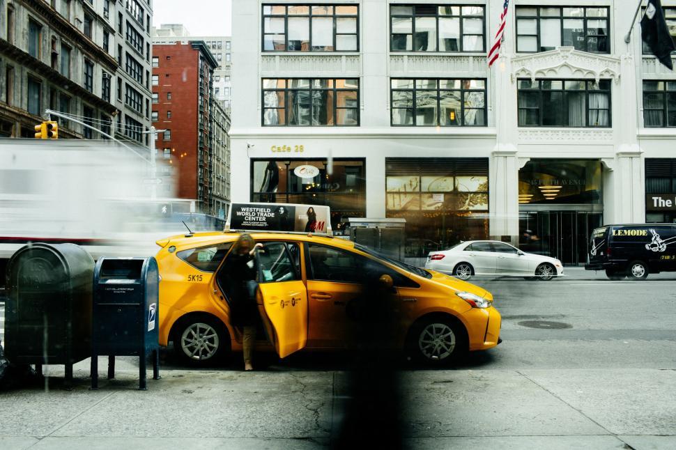 Free Image of Yellow Car Parked on Side of Road 