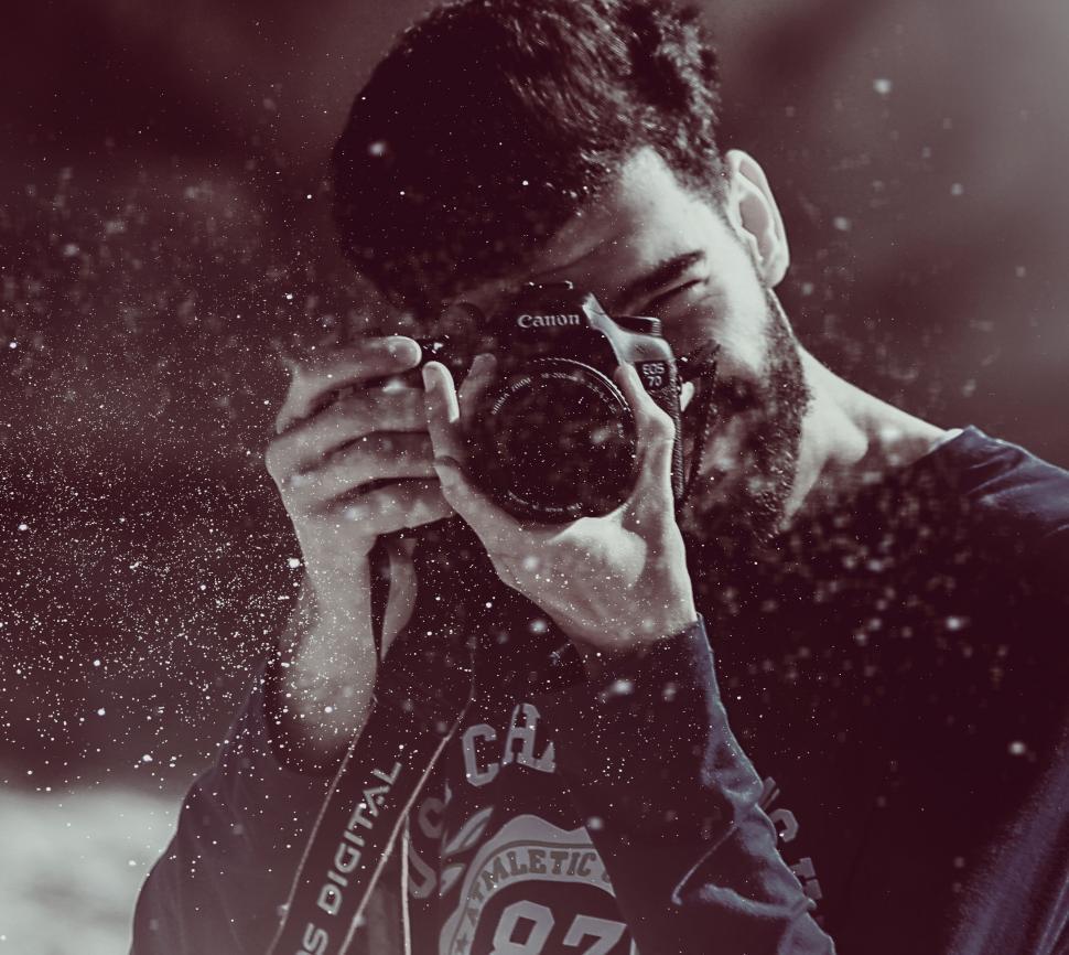 Free Image of Man Taking Selfie With Camera 
