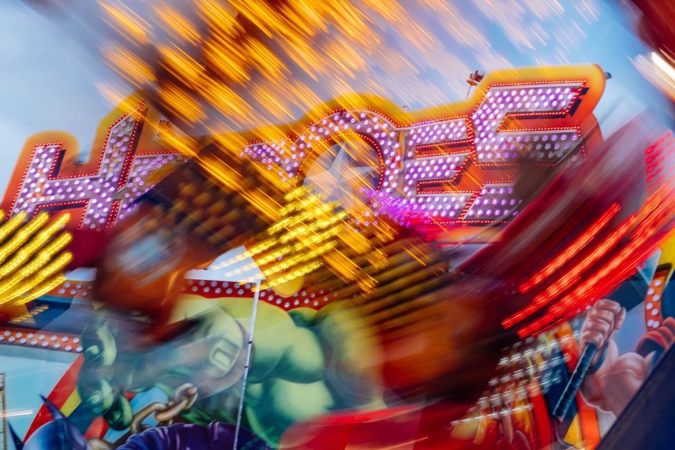 Free Image of Blurry Photo of a Carnival Ride 