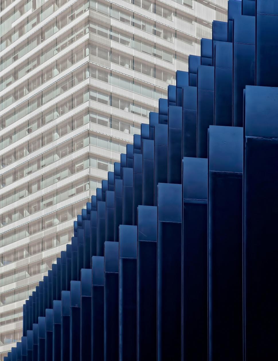 Free Image of Towering Building With Numerous Windows 