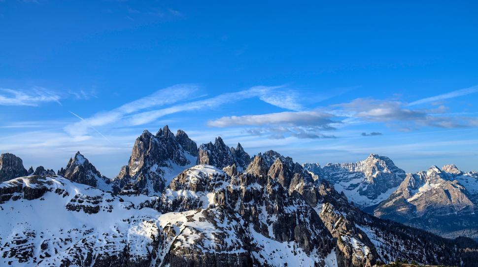 Free Image of Snow-covered Mountains Under Blue Sky 
