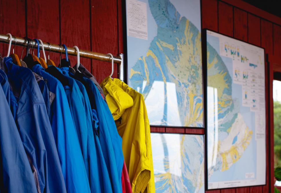 Free Image of Assorted Shirts Hanging on a Rack 