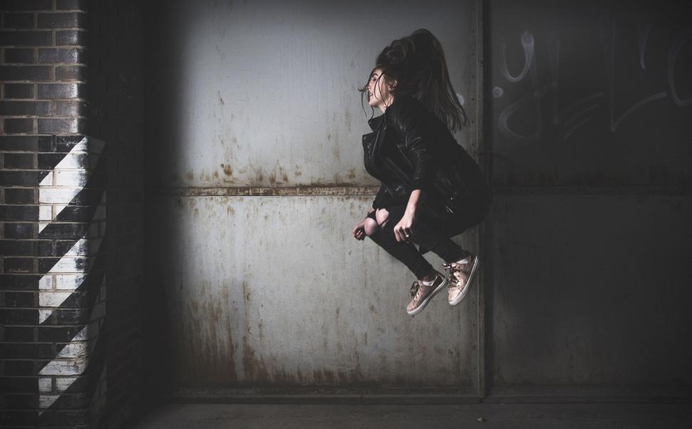 Free Image of Man Flying Through the Air on Skateboard 