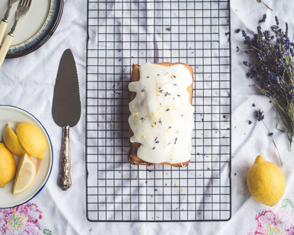 Free Image of Piece of Bread With White Frosting on Cooling Rack 