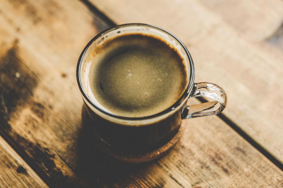 Free Image of A Cup of Coffee on a Wooden Table 