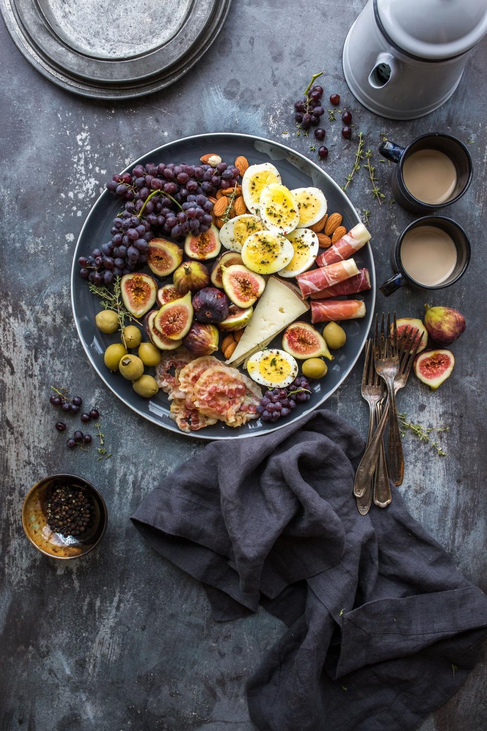Free Image of Plate of Food and Cup of Coffee on Table 