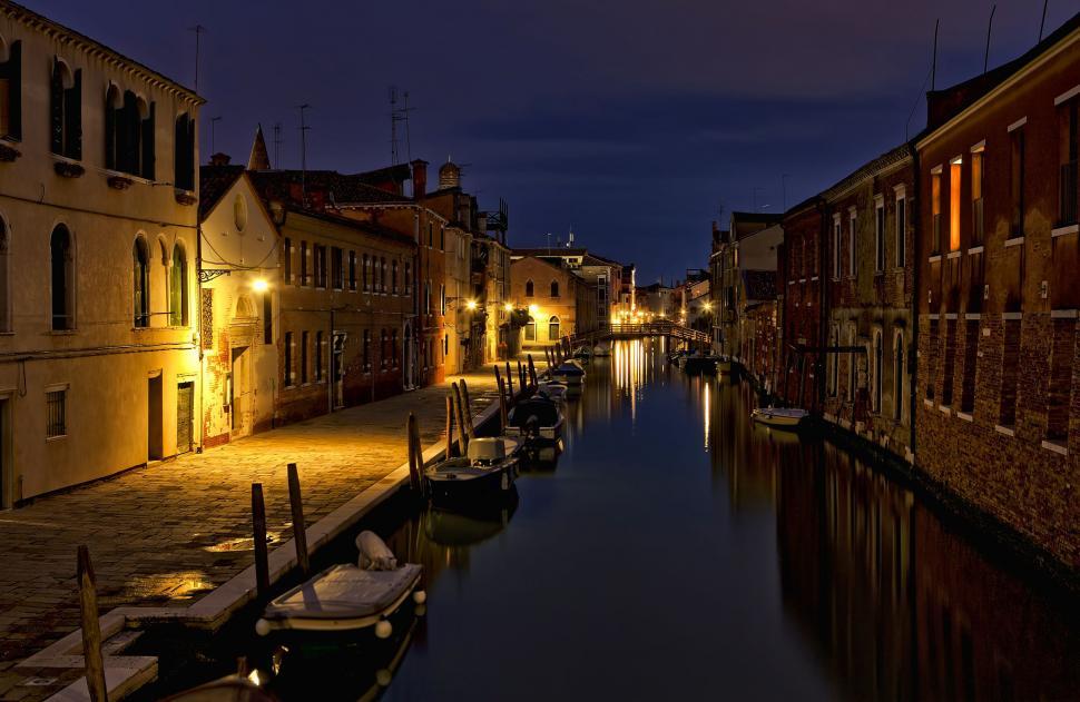 Free Image of Boats Sailing Through a Canal 