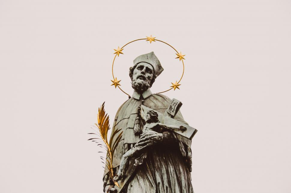 Free Image of Statue of a Man Holding a Child 