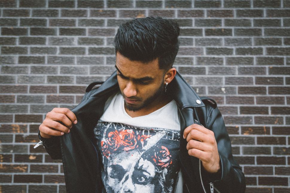 Free Image of Man in White Shirt and Black Jacket 