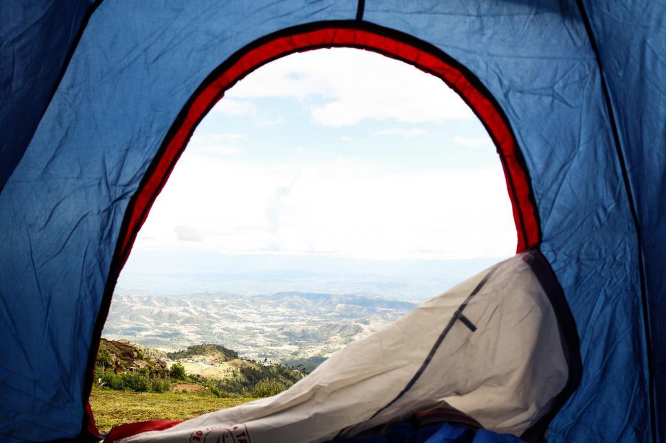 Free Image of Blue and Red Tent Overlooking Valley 