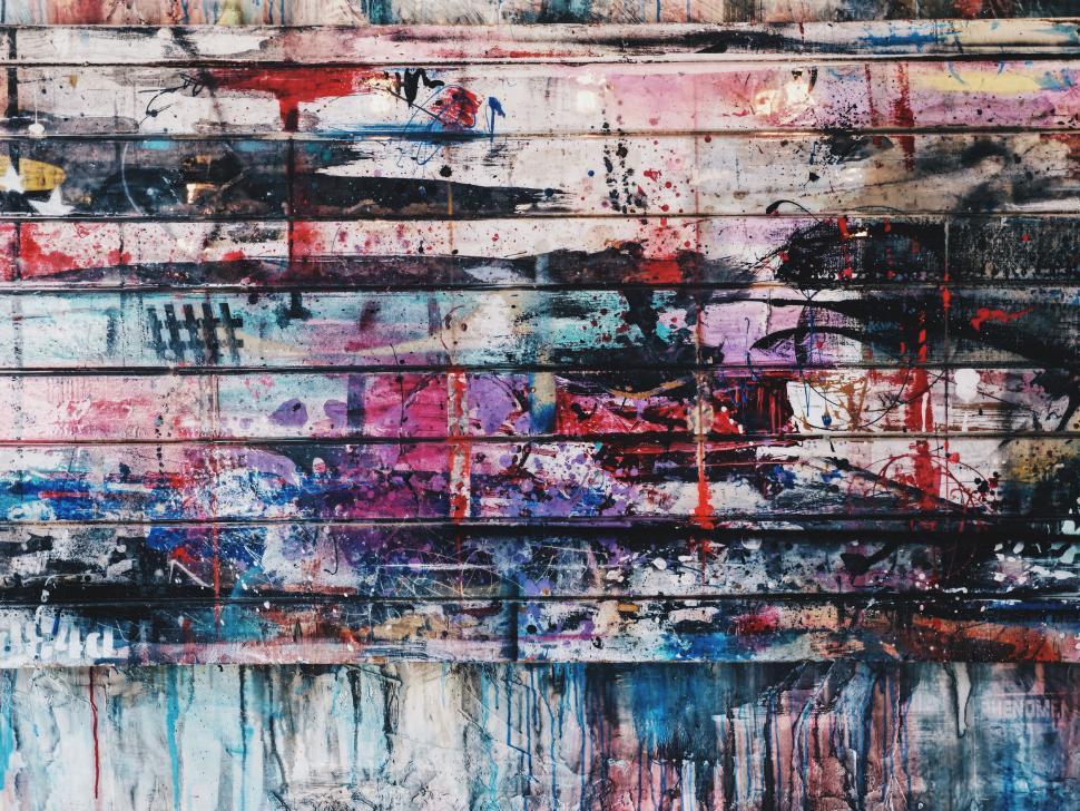 Free Image of Vibrant Painting With Multicolored Abstract Patterns 