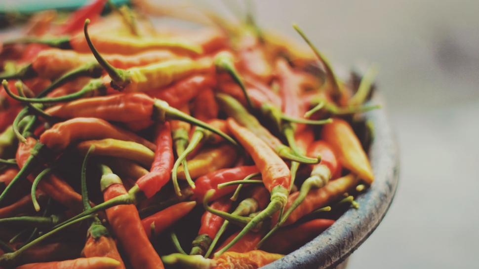 Free Image of Bowl Filled With Red and Green Peppers 