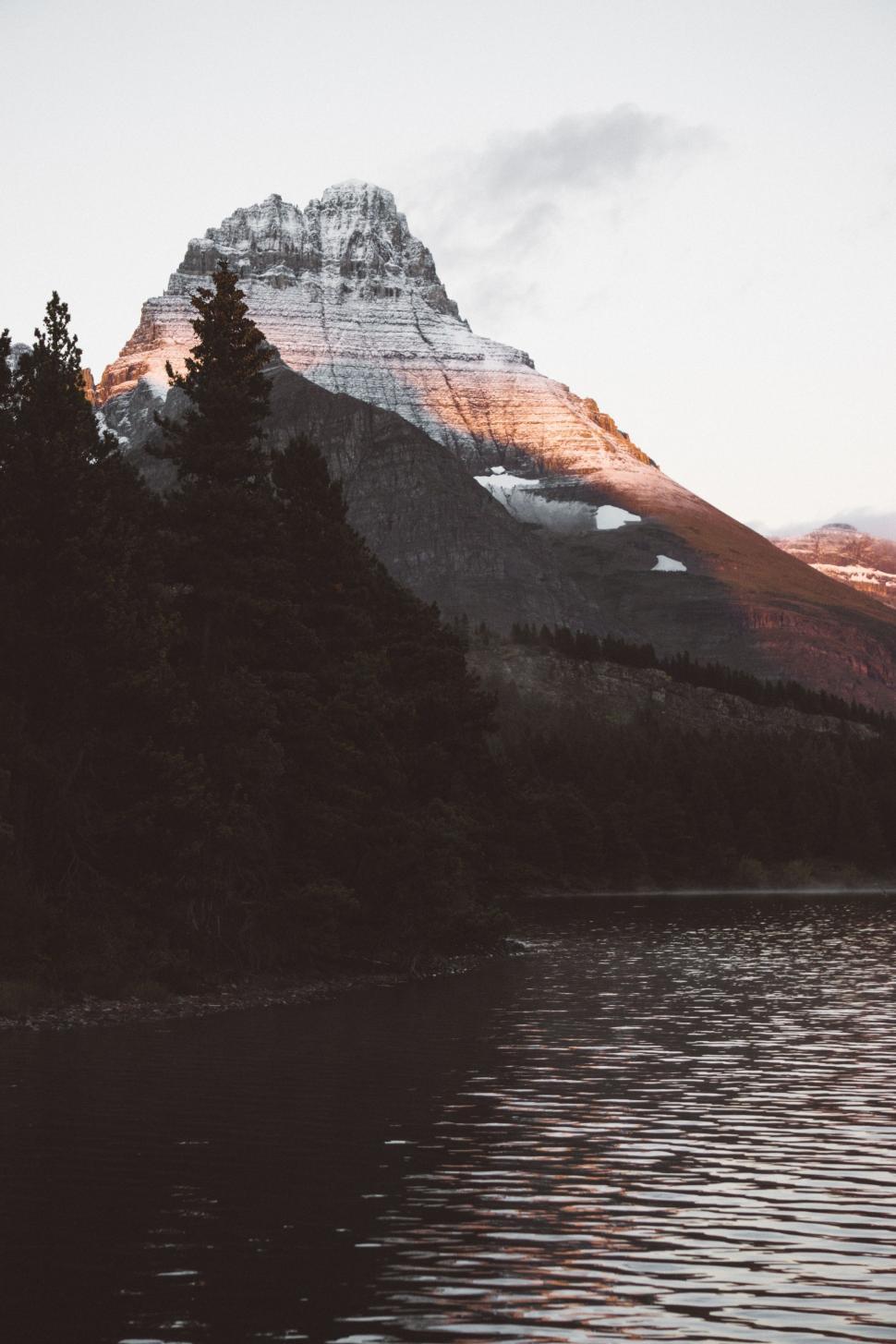 Free Image of Majestic Mountain Overlooking Tranquil Lake 