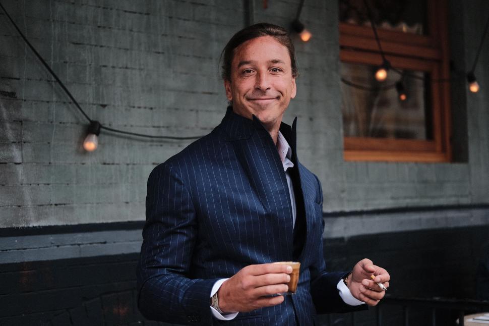 Free Image of Man in Suit and Tie Standing in Room 