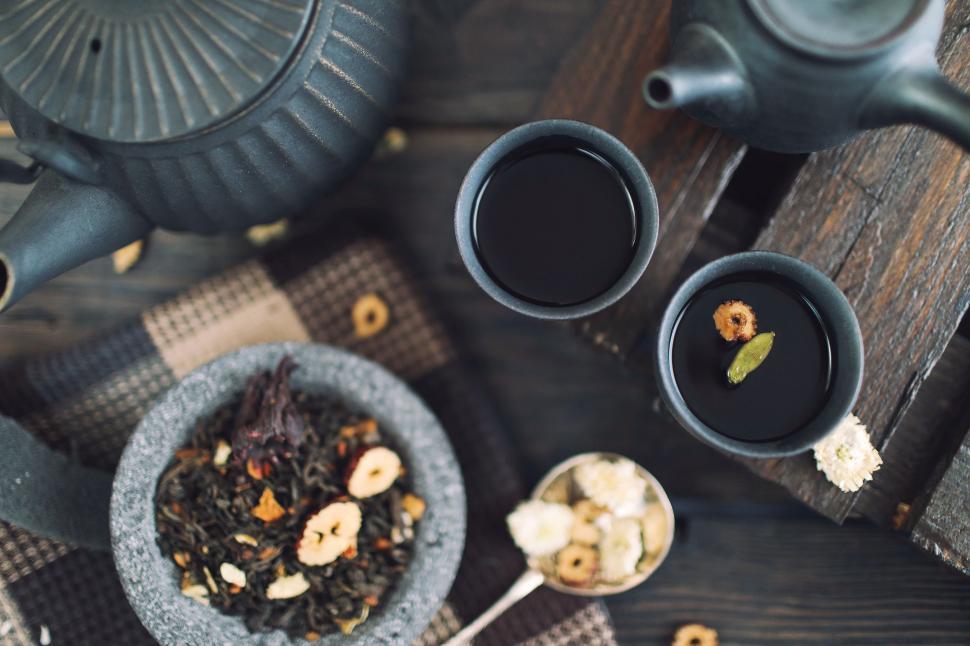 Free Image of Table Set With Two Cups of Tea and a Plate of Food 
