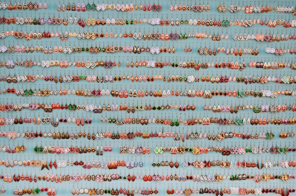 Free Image of Blue Wall Covered With Buttons 