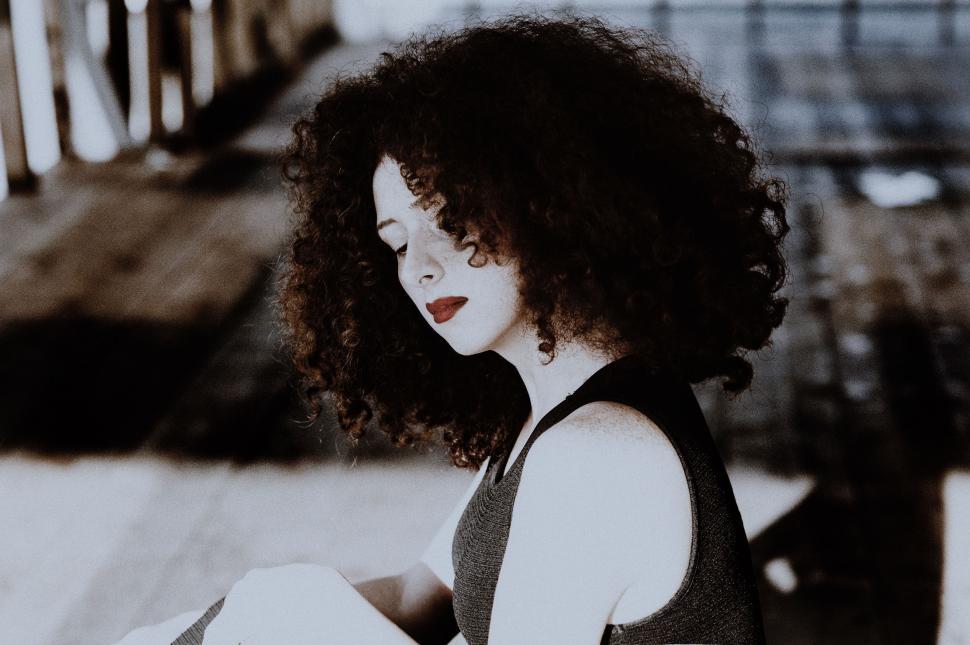 Free Image of Woman With Curly Hair in Black and White 