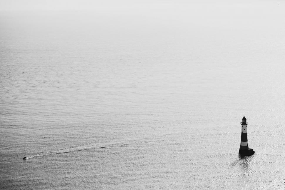 Free Image of Lighthouse Standing in the Ocean 