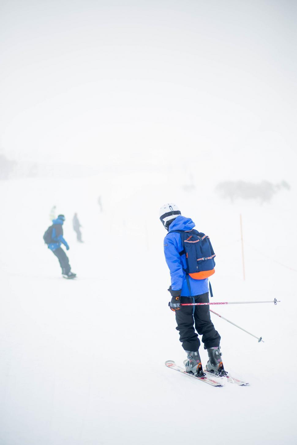 Free Image of Man Skiing Down Snow Covered Slope 