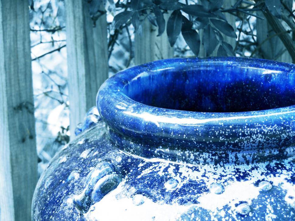 Free Image of Large Blue Vase by Wooden Fence 
