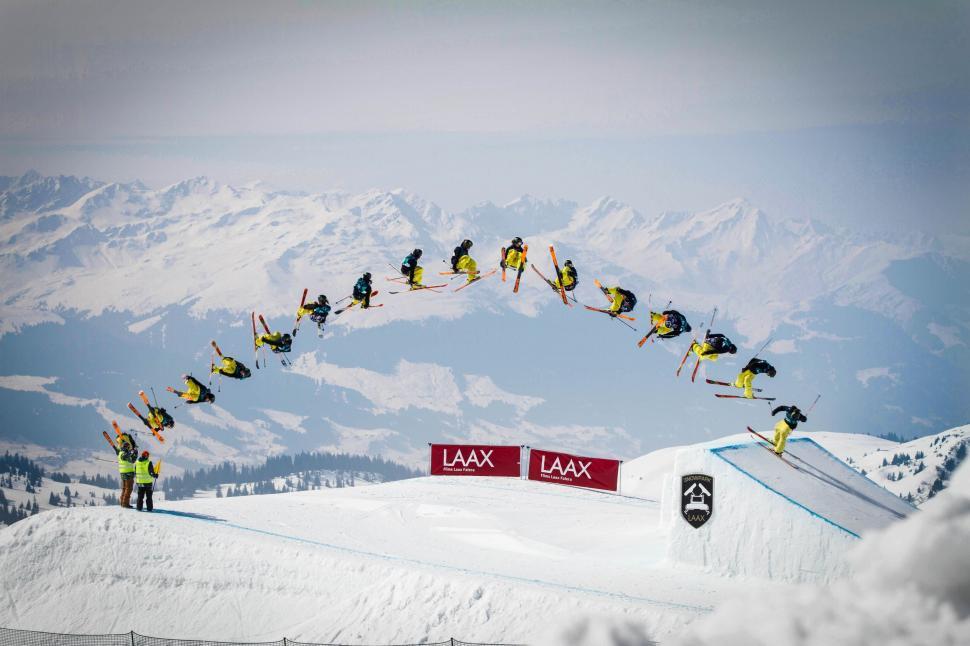 Free Image of Man Soaring Through Air on Skis 