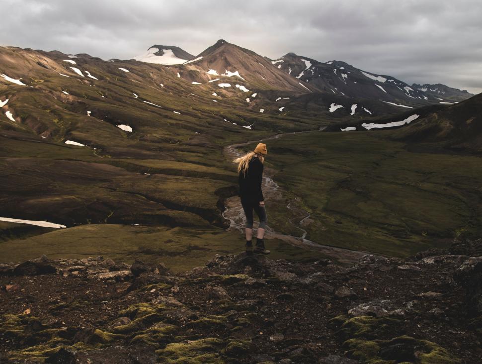 Free Image of Person Standing on Top of a Mountain 
