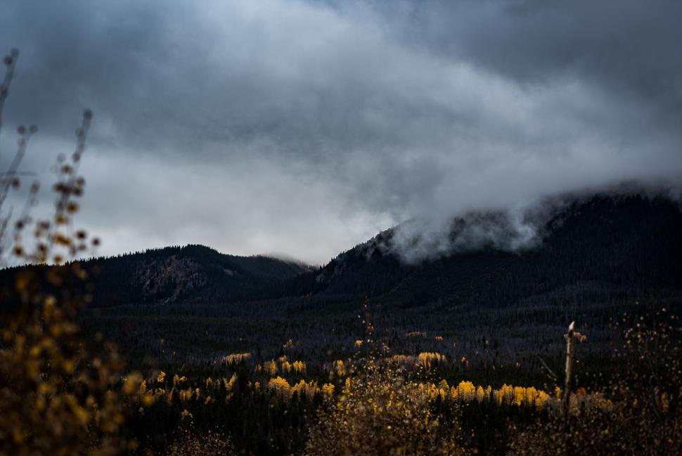 Free Image of Majestic Mountain Range Under Cloudy Sky 