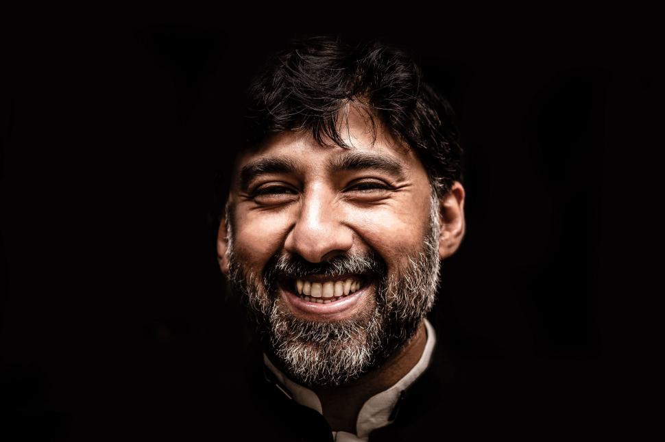 Free Image of Bearded Man Smiling at Camera 