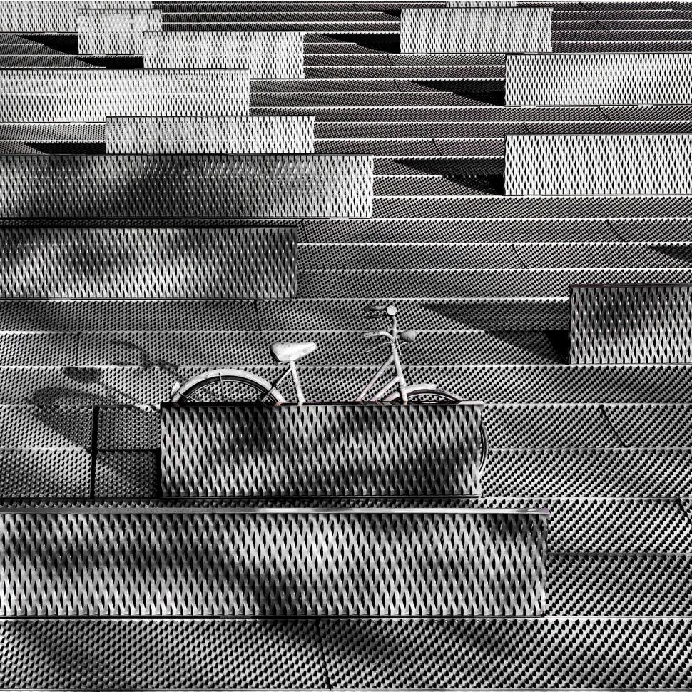 Free Image of Bicycle Parked on Steps of Building 