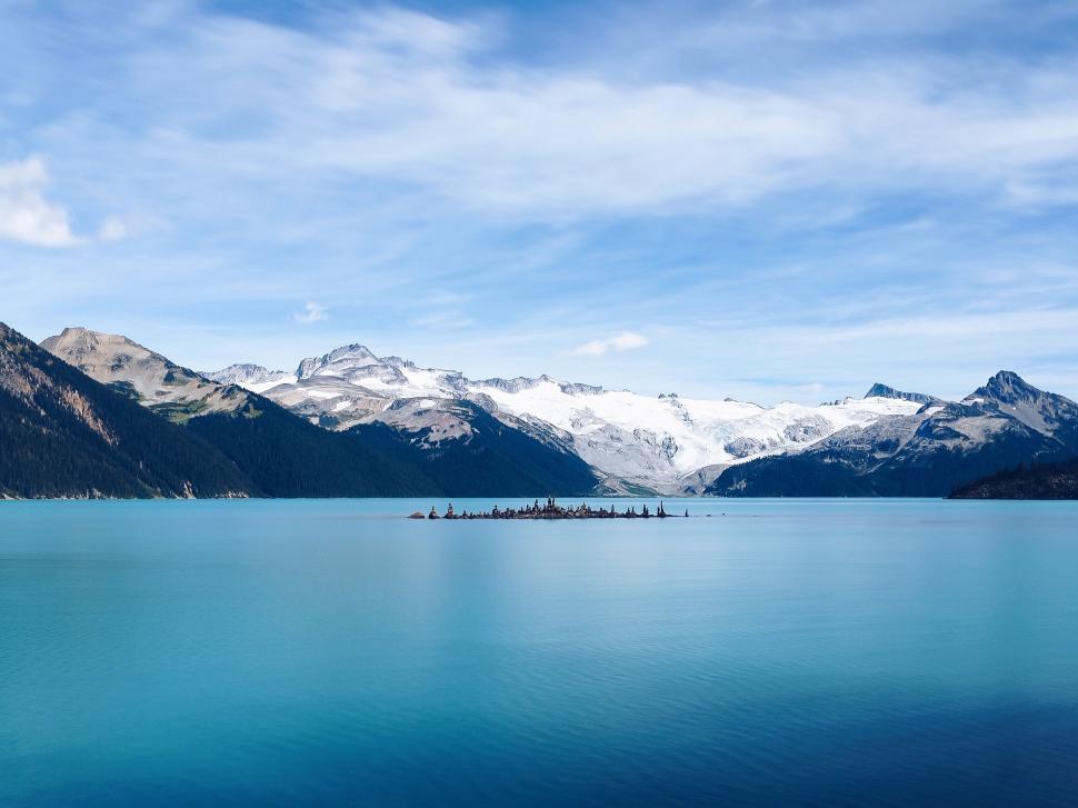 Free Image of Majestic Body of Water Surrounded by Mountains 