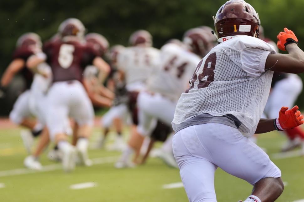 Free Image of Football Player Running With Ball 
