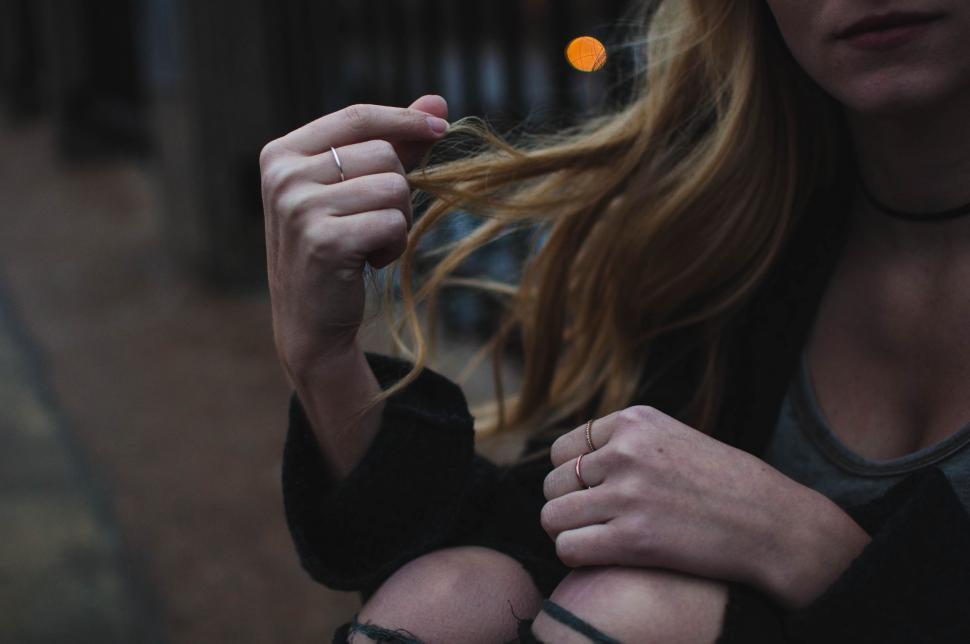 Free Image of Woman Holding a Glass of Wine 