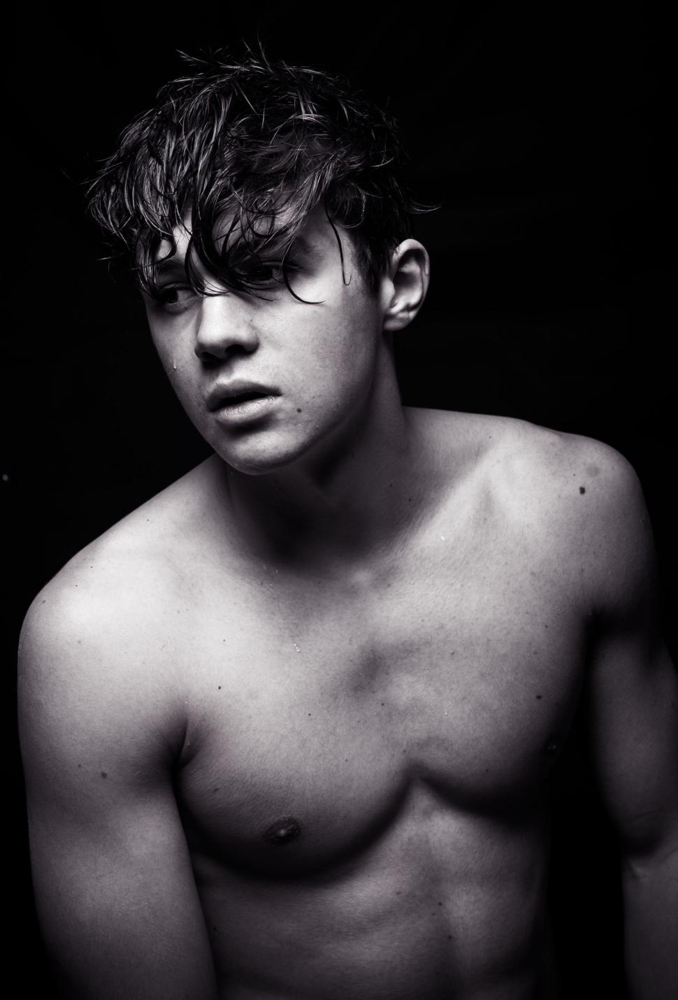 shirtless-young-man-posing-for-picture.jpg