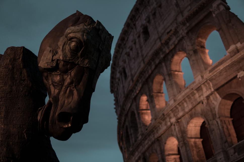 Free Image of Statue of a Horse Next to a Building 