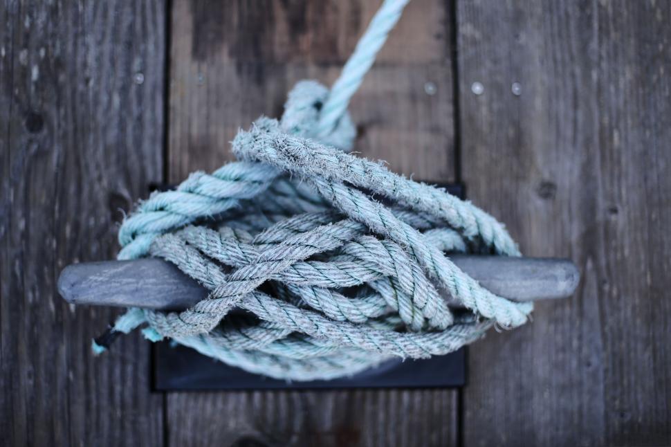 Free Stock Photo of Rope Hanging From Hook on Wooden Wall