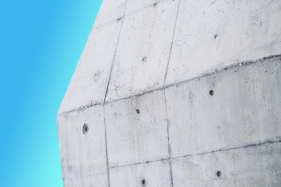 Free Image of Man Riding Skateboard Down Cement Wall 