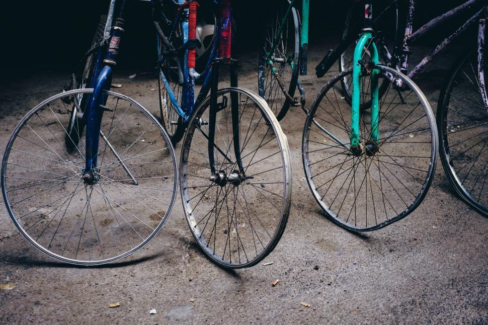 Free Image of Two Parked Bikes Next to Each Other 