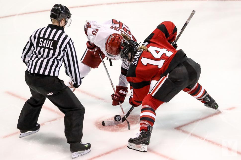 Free Image of Two Hockey Players Engaged in Ice Hockey Game 