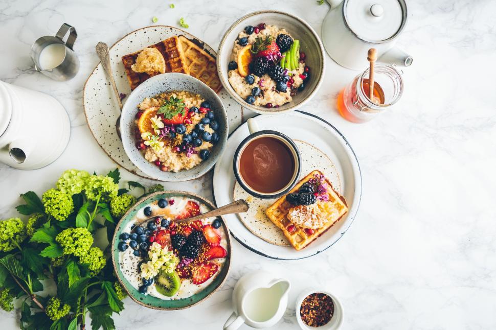 Free Image of Table Set With Plates of Food and Cups of Coffee 