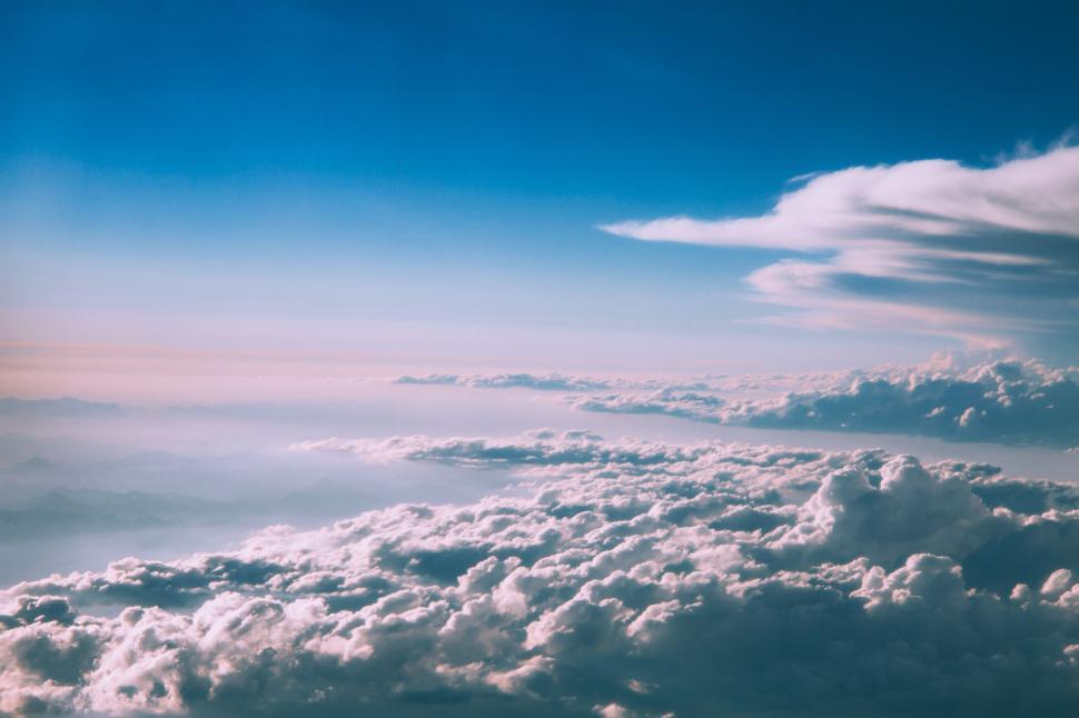 Free Image of A View of Clouds From an Airplane Window 