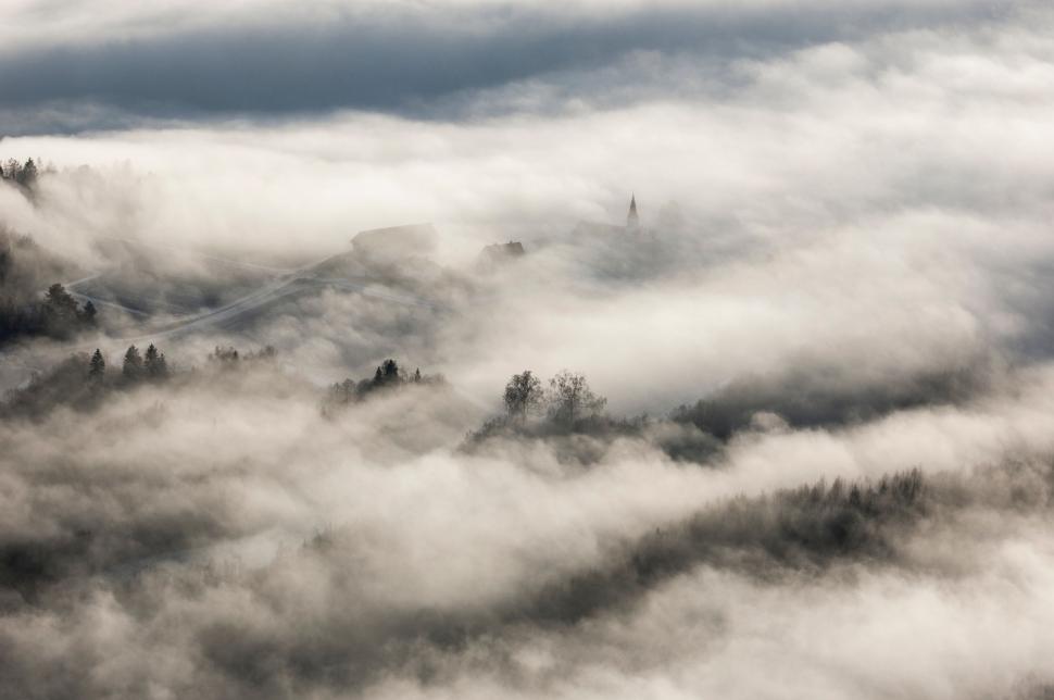Free Image of Mountain Shrouded in Clouds 