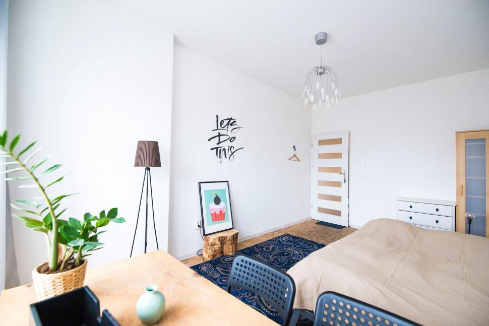 Free Image of Bedroom With Bed and Table 