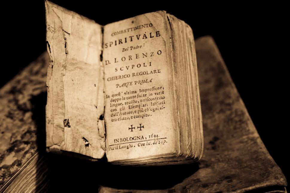 Free Image of Book Resting on Wooden Table 