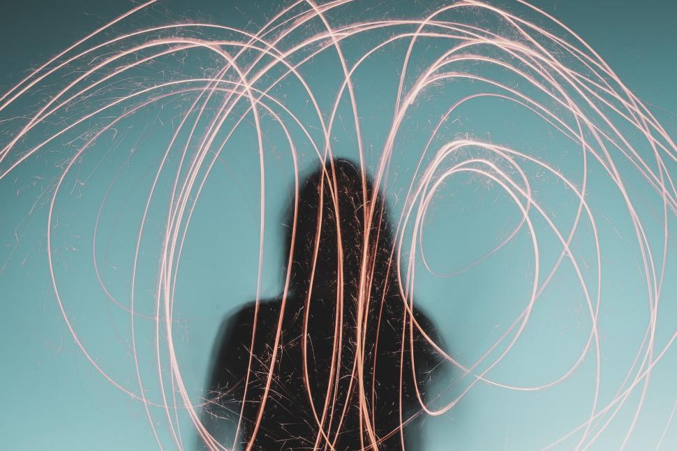 Free Image of Blurry Image of Person With Long Hair 