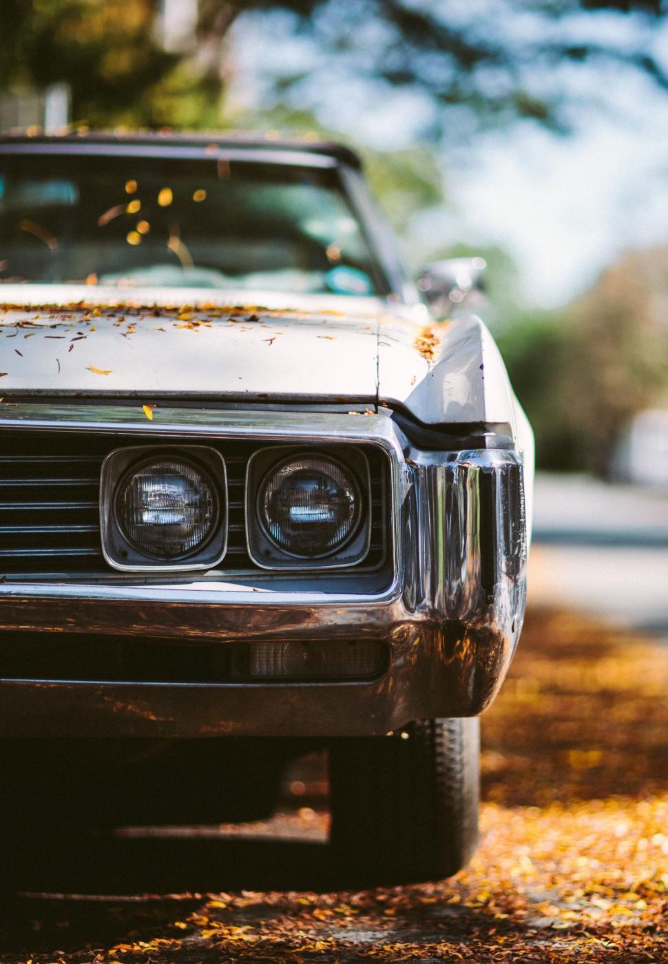 Free Image of Old Car Parked on the Side of the Road 