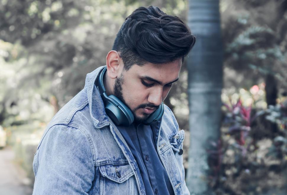 Free Image of Bearded Man Listening to Music With Headphones 