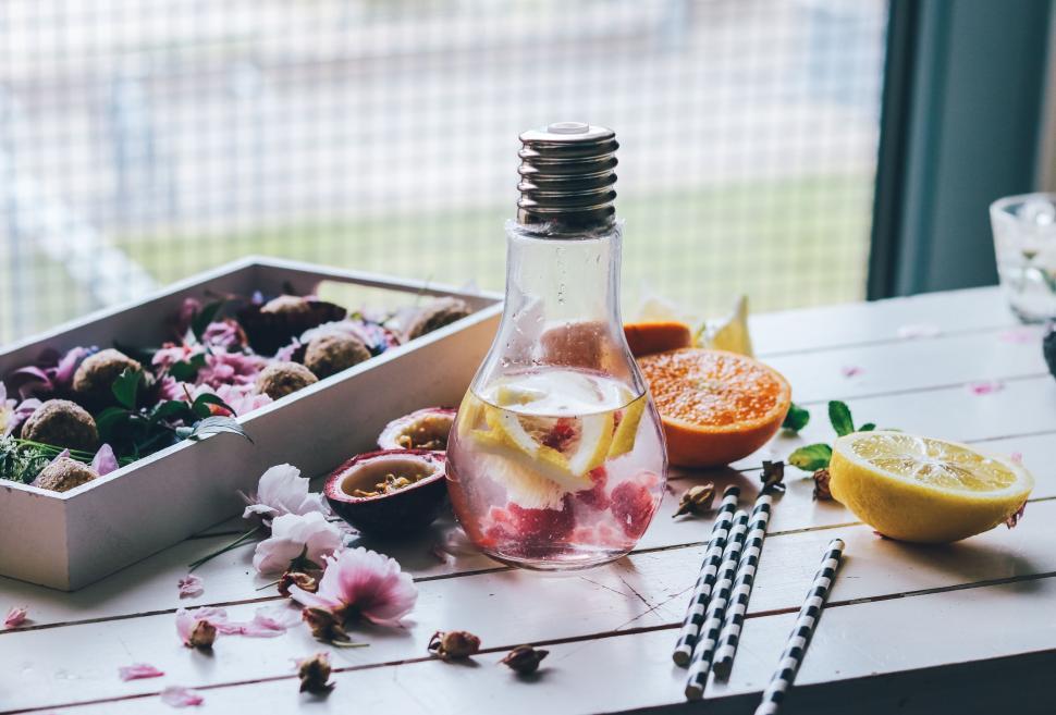 Free Image of Table Set With Tray of Food and Bottle of Liquid 