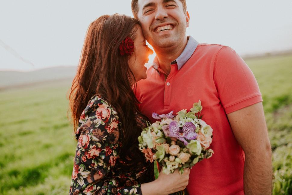 Free Image of Man and Woman Standing in Field 