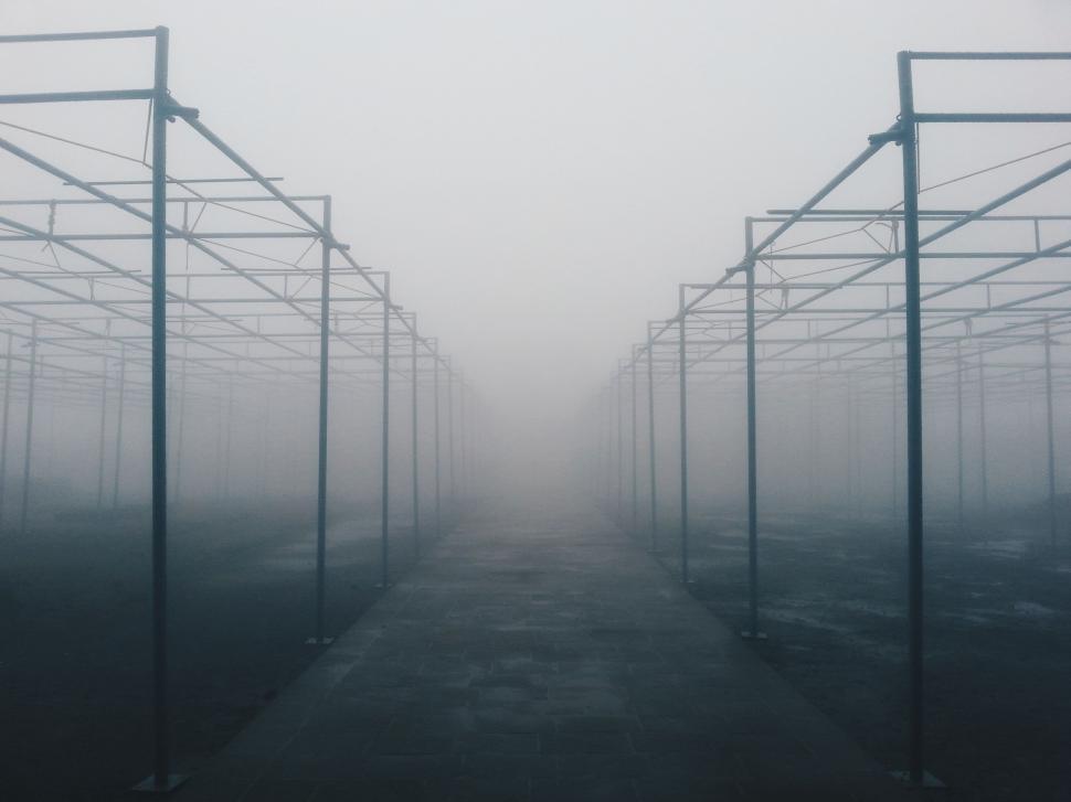 Free Image of Row of Cages in Black and White 